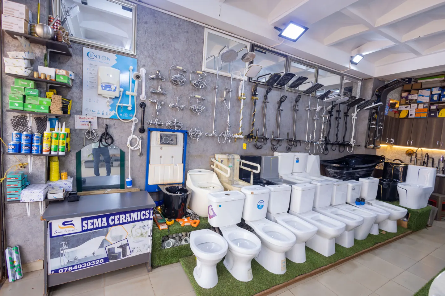 Sanitary ware and bathroom fittings displayed inside the Sema Ceramics showroom