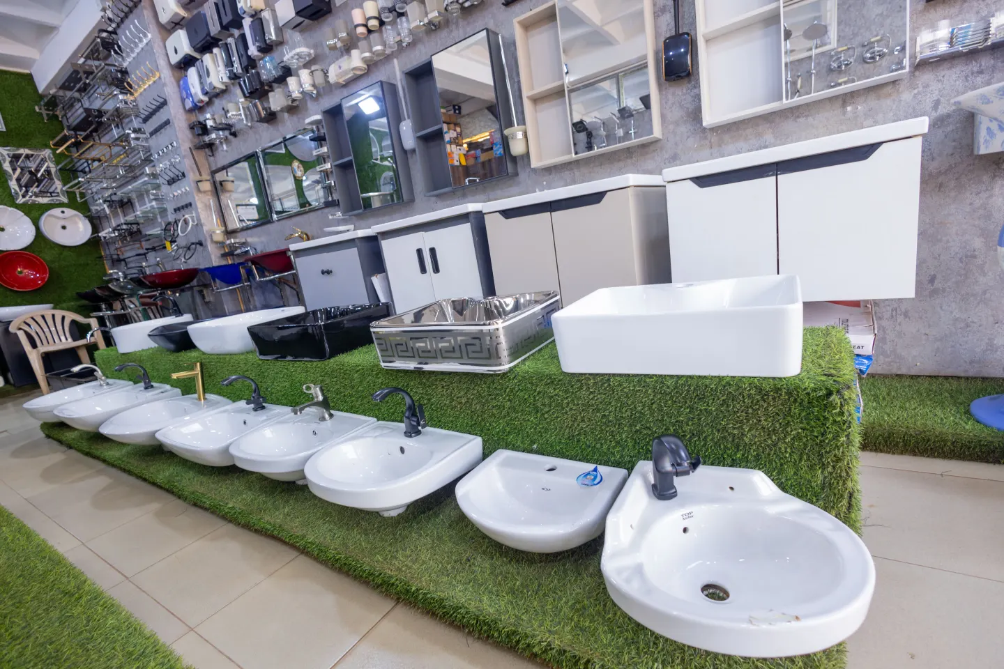 Bathroom basins, mirrors and fittings displayed in the Sema Ceramics showroom
