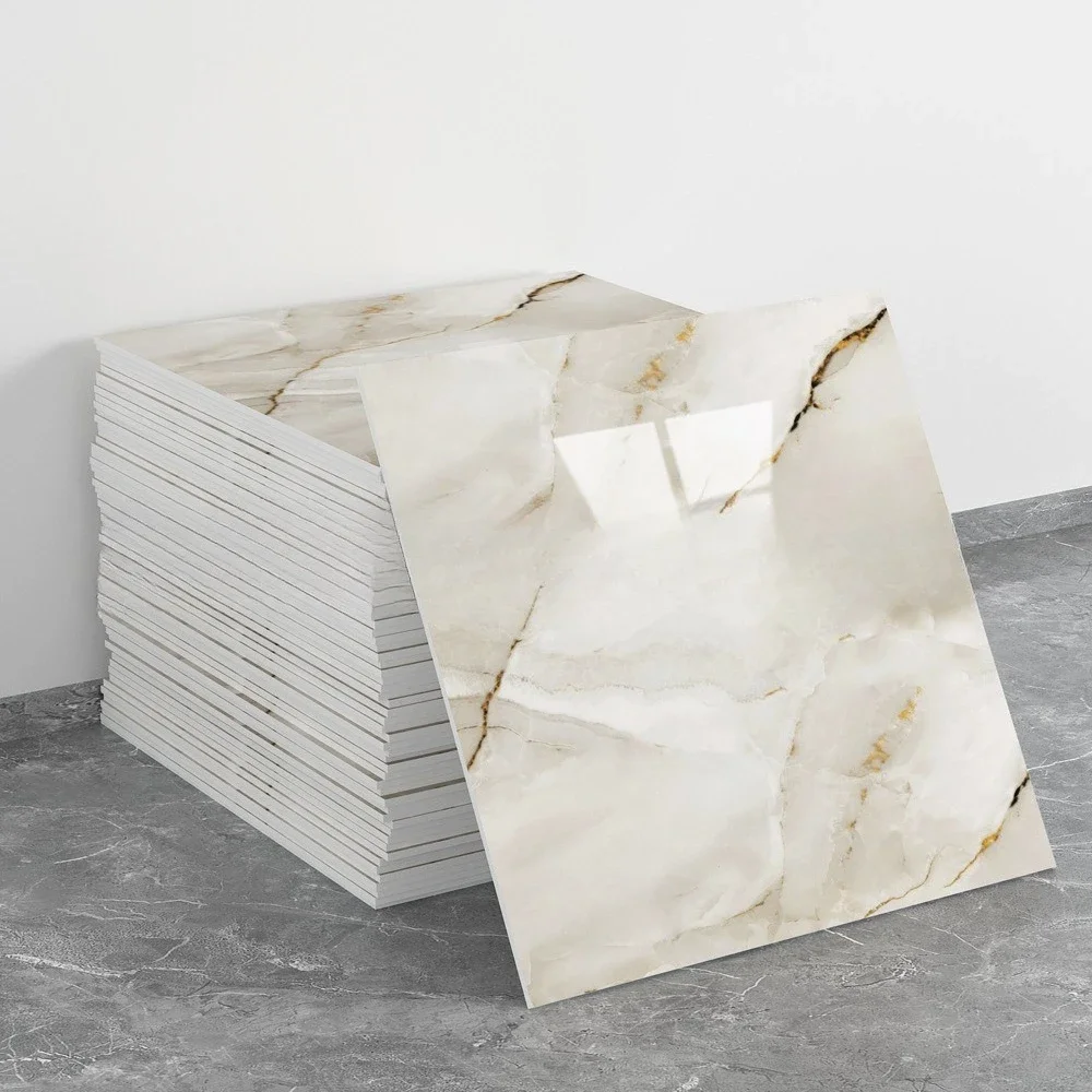Stack of polished cream marble-look ceramic tiles